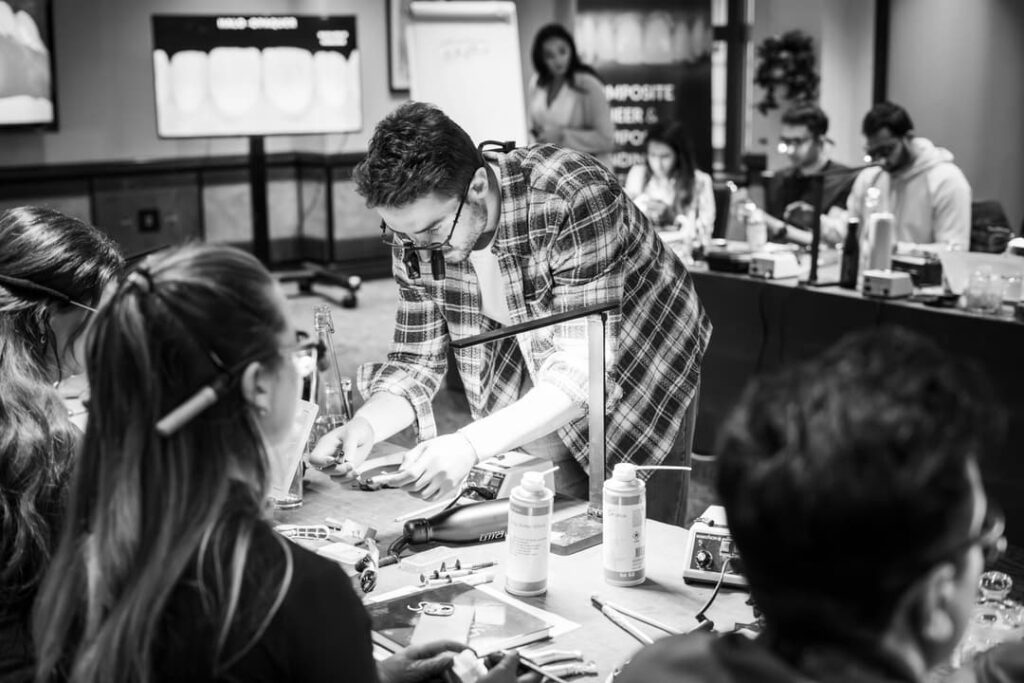 Dr Albert helping a delegate on the Simplifi Layering Course