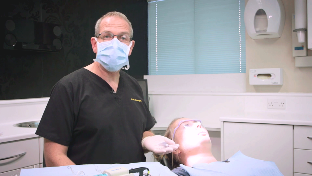 Dominic Hassall demonstrating treatment on a practice model